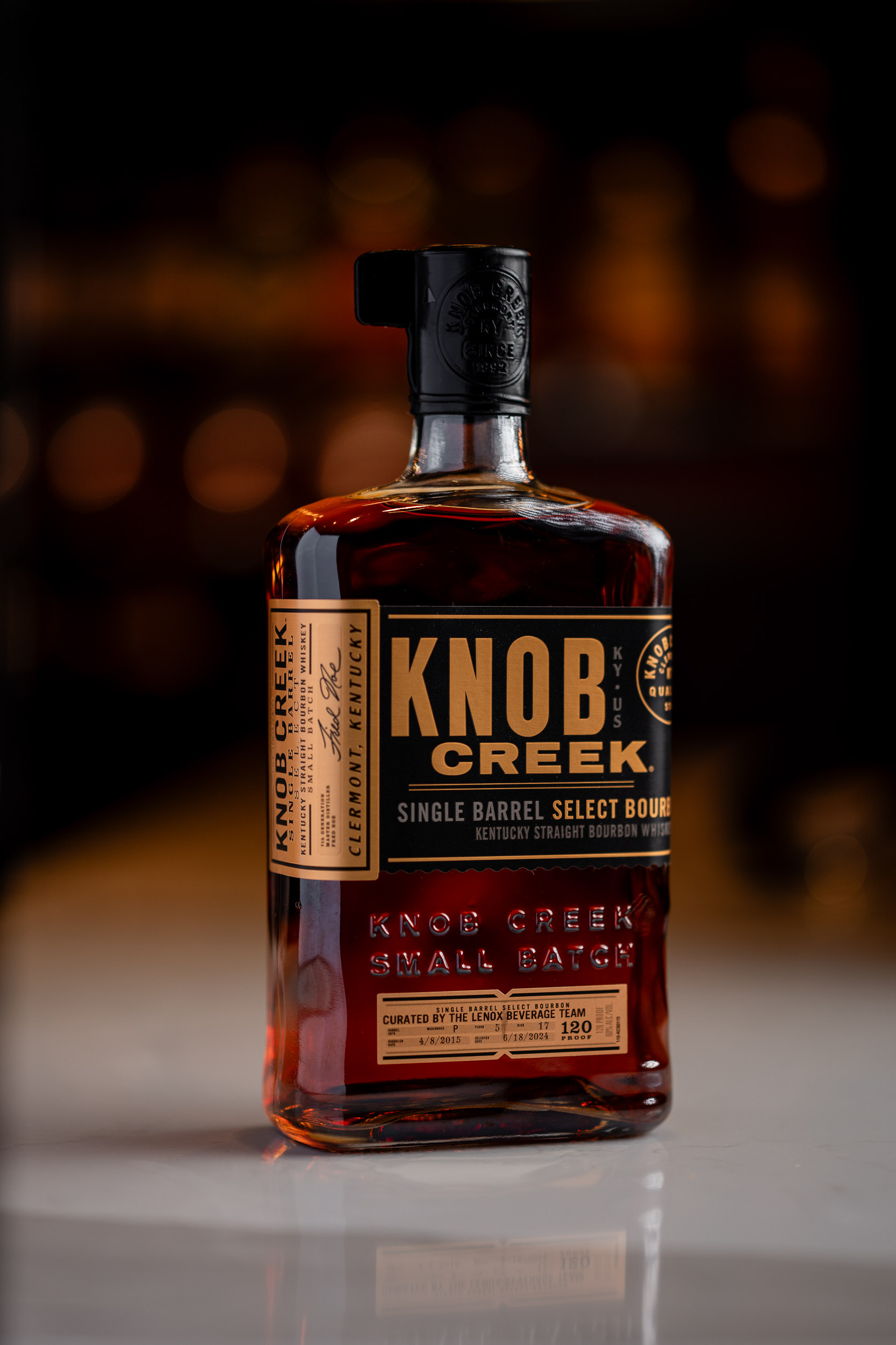 knob creek bourban sitting on the bar